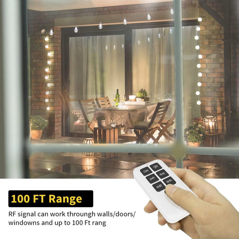 Rock Solid Dual Outlet Outdoor Timer Plug With Dope Slick Wireless Remote Control in use from inside, displaying 100 ft range.