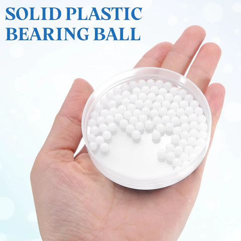 200 Piece Slick POM Plastic Bearing Balls 5 Mm Solid Roller Beads in hand, ideal for drawer glides and smooth sliding hardware.