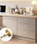 Total Flex For Your Cabinetry With This 4 Pack Of 32mm Golden Metal Drawer Knobs Featuring Asian Ink Red Plum Blossom Designs And Complete Screw Kits For Effortless Installation That Truly Slays on a stylish cabinet.