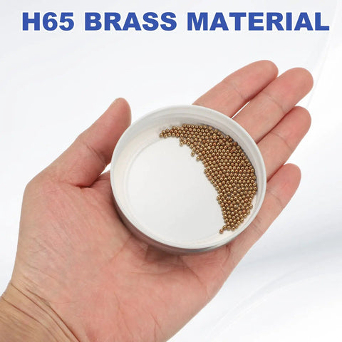 Top Shelf Precision 300 Pack H65 Brass Bearing Balls 2 mm G200 Metal Spheres in a hand showing brass material.