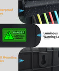 Heavy Duty Outdoor Electrical Box With Tough As Nails IP54 Rain Cover To Keep Your Power Strips Timers And Extension Cords Safe From Wild Weather While Keeping Your Yard Gear Locked And Loaded Year Round In Smooth Black features waterproof eave, warning label, and wall mounting holes.