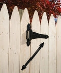 Heavy Duty 14 Inch Gate Spring Self Closing Adjustable Tension Black Powder Coated Rust Resistant Built Tough Outdoor Fence Hardware mounted on wooden fence.