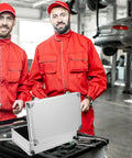 Rugged Aluminum Alloy Tool Case With Sturdy Carry Handle For Mechanics And Weekend Warriors in a garage with two mechanics.