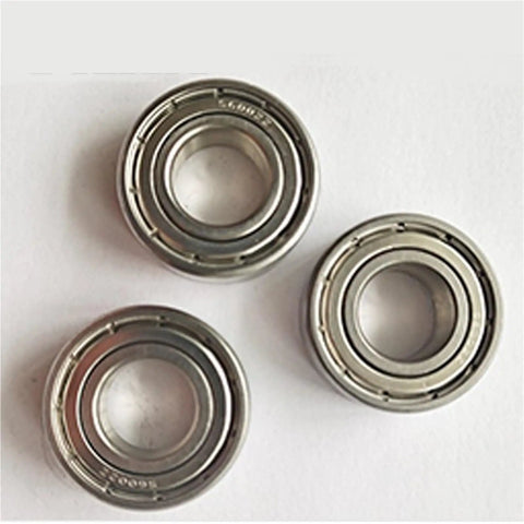 Professional Grade Solid Performer 440 Stainless Steel Deep Groove Ball Bearing S6015ZZ 75X115X20MM triple view on white background