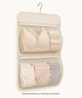 Slick Hanging Closet Sorter With Dual Zippered Mesh Pouches For Hassle Free Underwear And Sock Taming In Smooth Cream Cloth, showing mesh sections.