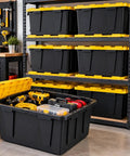 Rock Solid Heavy Duty Storage Totes With Secure Lids 27 Gallon 4 Pack Stackable Plastic Bins 100 Pound Capacity, organized garage storage.