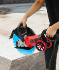 Heavy Duty Electric Concrete Cutter With 13 Inch Diamond Blade And Rolling Stand 4000W, held for basement wall cutting.