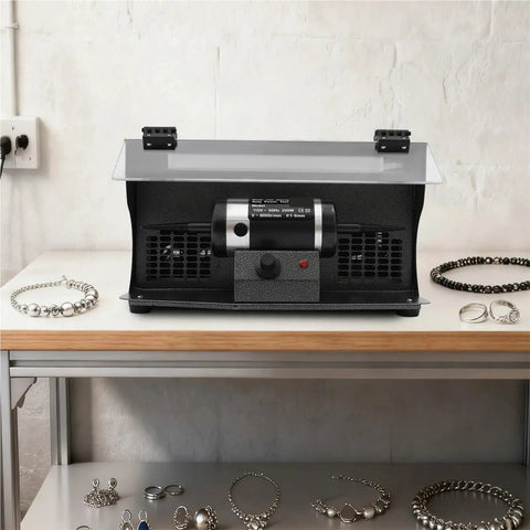 Polishing Machine with Dust Collector and Variable Speed 0-8000 RPM 200W Pure Copper Motor on workshop table with jewelry.