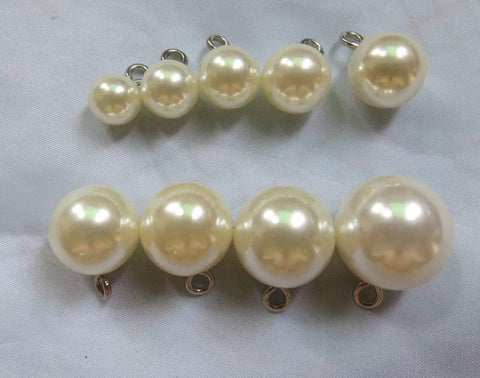 Tough As Nails Premium 304 Stainless Steel Screw Eye Hooks 5Mm By 10Mm attached to pearl beads for bracelet embellishment.