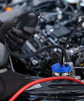 Two Piece Universal Intake Adapter For Automotive Smoke Machine Smoke Leak Tester With Inflatable Bladder For Fast 12V Rig and Truck Pipe being used on a vehicle.