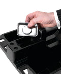 Hand holding magnetic tray of On The Go Tool Caddy With Magnetic Tray Heavy Duty Portable Organizer For Gear, showing storage compartments.