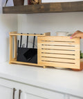 Rustic Pine WiFi Router Storage Box With Wall Mount Decorative Modem Shelf Hider And Cable Management System Keeps Your Router Looking Slick Up To 11 Inches Tall Easy Home Organization For Modern Living on a kitchen counter.