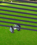 Heavy Duty Sliding Gate Hardware Kit With Double Wheel Track System, showing dual wheels on green grass for smooth operation.