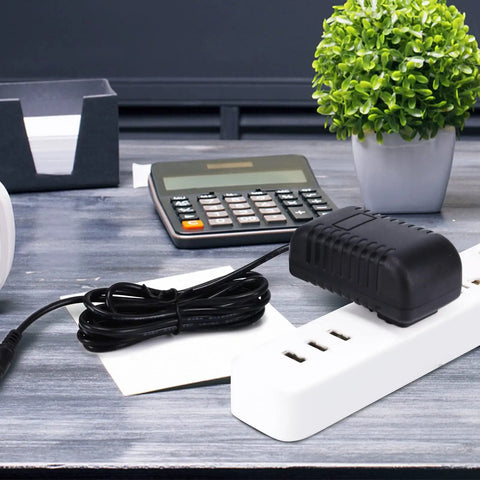 Smooth Replacement AC DC Wall Adapter Compatible With Dremel 2050 Rotary Tool Charger on power strip with workstation setup.