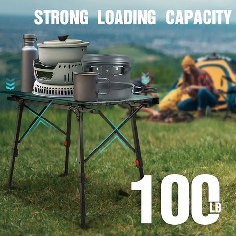 Ultra Lightweight Aluminum Folding Camping Table With Adjustable Legs Portable Beach And Picnic Table displayed outdoors with cookware