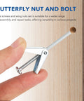 Close-up of person holding butterfly nut and bolt from Wing Nut And Toggle Bolt Kit With Drywall Anchors For Hollow Wall Mounting And Hardware Assembly.