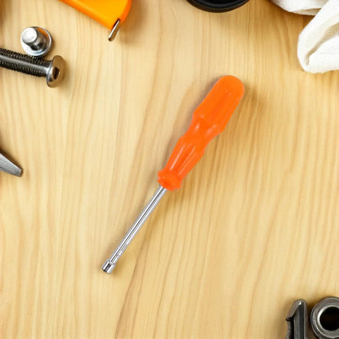 Heavy Duty Hex Socket Screwdriver Wrench With Swappable Bits For Nuts And Bolts on wooden work surface.