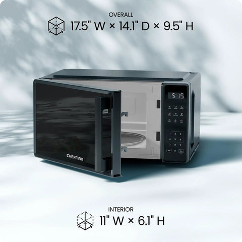 No Sweat Compact Countertop Microwave Oven 0.7 Cubic Foot 700 Watts, black, with open door, showing interior and control panel.
