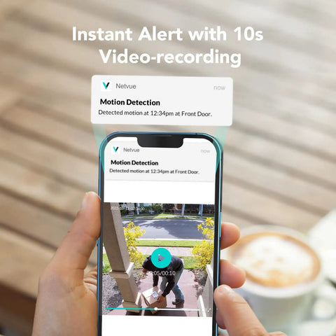 Person holding a phone with motion alert from Wireless Outdoor Security Camera With 2K Color Night Vision And AI Motion Detection.
