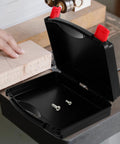 Go Anywhere Heavy Duty Plastic Tool Box Featuring Hella Spacious Compartments With Secure Snap Latches Plus Badass Job Site Organizer And Comfort Carry Handle open with screws inside on workspace.