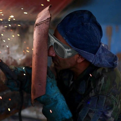 Worker using Heavy Duty Welding Safety Goggles With Interchangeable Lenses for protection while welding.