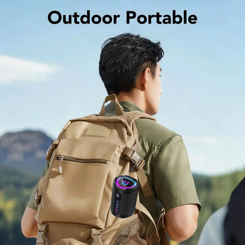 Man with portable Bluetooth speaker on backpack, perfect for travel, sports and parties, with LED light and IPX7 waterproofing.