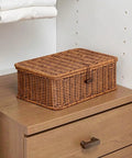 Three Piece Rectangular Woven Storage Bins With Lids Feature Slick Plastic Rattan Construction To Keep Your Home Tidy And Knocking Out Daily Clutter With Zero Hassle Prime Pick For Any Home Or Office placed on a wooden dresser.