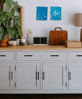 Slick Matte Black Cabinet Handles And Drawer Pulls With Three Inch Centers And Five Inch Overall Length In An Eighteen Pack on modern cabinetry.