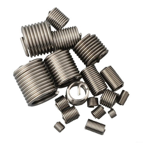 Close-up of 140 Piece Metric Thread Repair Kit M3 To M12 Stainless Steel Helicoil Set, various sizes on white background.