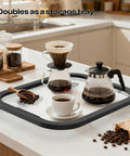 Slick Acrylic Appliance Slider With Smooth Gliding Wheels Move Coffee Makers And Air Fryers Without A Sweat Countertop Protector Dolly Protects Surfaces Zero Strain Kitchen Essential with coffee setup on tray.