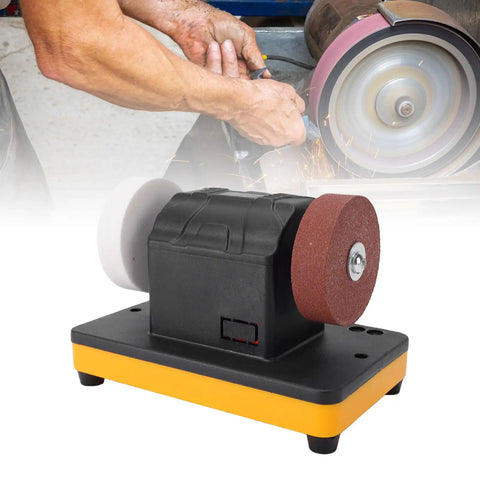 Solid Mini Bench Grinder With Adjustable 2000 To 6000 Rpm Dial For 18V Battery Packs showing rubber feet and dual discs for sharpening.