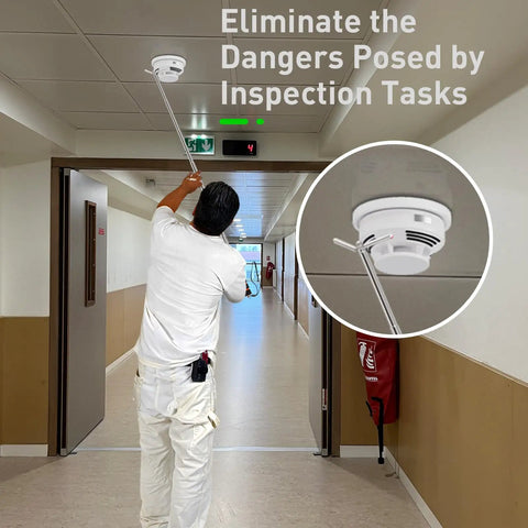 Person using Built Different Extendable Smoke Detector Tester Pole And Emergency Exit Light Reach Wand to test a smoke detector.