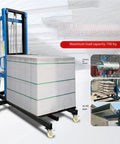 Heavy Duty Mobile Lift Platform With Thickened Steel Base And Wheeled Material Hoist for raising heavy blocks in work zones.