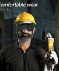 Job Site Tough Flip Up Welding Safety Glasses With Vented Anti Fog Shell Double Layer Shatterproof Lenses For Stick Mig Argon Cuts And Everyday Shop Grinds 2 Pack worn by a man with a yellow hard hat, holding a tool.