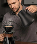 Man using Gooseneck Electric Kettle With 1 Degree Temperature Control 1500W Fast Heating Pour Over Coffee And Tea Kettle With Brew Timer