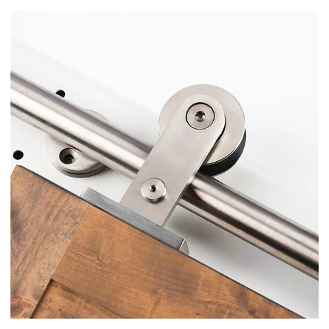Heavy Duty Sliding Barn Door Hardware Kit In Brushed Stainless Steel showcasing smooth glide roller mechanism and wooden door edge.