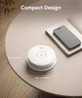 No Sweat Setup Photoelectric Smoke Detector And Hardwired Fire Alarm With Interconnected Wiring And 9V Backup on a table beside a smartphone.
