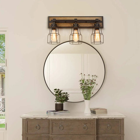 Two Light Farmhouse Vanity Light With Vintage Black Metal Cage And Rustic Wood Finish, E26 Base, above a mirror and dresser