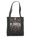 Rad Knucklebuster Plumber Shirt for Pipefitters and Plumbers Being a Plumber Is Not a Big Thing Its a Million Little Things Funny Trade Grind Dad Tee Gift for Handymen Valve Experts with Tote Bag showing colorful graphic on a canvas tote bag.