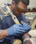 Pro Grade Laser Safety Glasses Serving Up Dead Straight Vision And Knockout Defense Across Two Hundred To Five Hundred Forty Nano Meters Plus Eight Hundred To One Thousand One Hundred For Q Switched Tattoo Removal And Med Spa Treatments Daily worn by technician during laser tattoo removal.