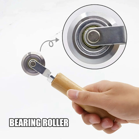 Top Tier 5 Piece Box Resizer Kit Featuring Scoring Wheel Perforator Precision Ruler Craft Knife And Tough Pp Storage Crate For No Sweat Custom Shipping Cartons And Straightforward Diy Builds close-up of scoring wheel bearing roller with wood handle.