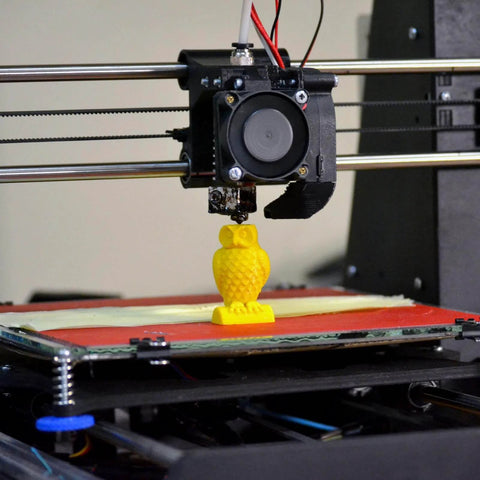 3D printer creating yellow owl figure, showcasing process for using Knurled Insert Nuts, 25pcs M6 x 5mm L x 8mm OD for secure embedding.