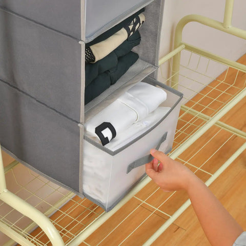 Big Time Hanging Closet Organizer With One Easy Fold Drawer And Three Roomy Shelves For No Sweat Closet Organization And Rock Solid Rod Mount Storage In Classic Grey with stacked clothes and slide drawer.