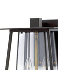 Close-up of Walker Collection LED Wall Mount Lantern in Buckeye Bronze Finish, showcasing glass panels and gold accents.