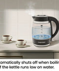 Fast 1.8L Electric Kettle 1500W for Quick Boil Tea Coffee, borosilicate glass, cordless, with auto shut off, on a kitchen counter.