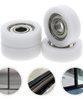 Top Notch 4 Pack Sliding Door Pulley Wheels Heavy Duty Nylon Replacement Rollers For Dang Smooth Track Operation With Precision 608 Zz Bearings close-up of white nylon rollers with steel bearings