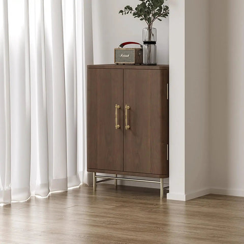 Heavy Duty Five Inch Solid Brass Cabinet Pulls In Brushed Matte Gold on a stylish brown cabinet with curtains.