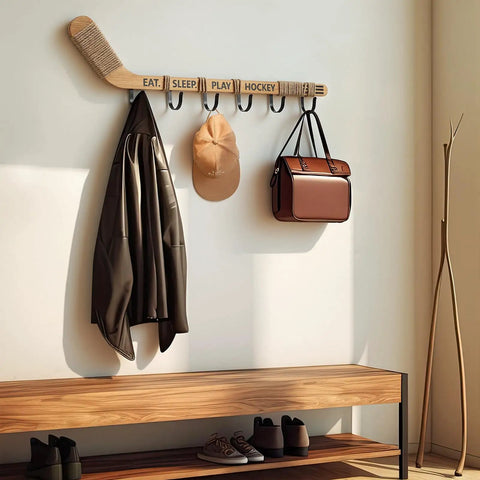 Top Shelf Hockey Stick Coat Rack Featuring Six Rock Solid Hooks Ideal For Dropping Your Jackets Hats And Gear Quick Wall Mounted Storage Piece That Saves Floor Space And Keeps Your Entryway Clean with a brown leather coat and bag.