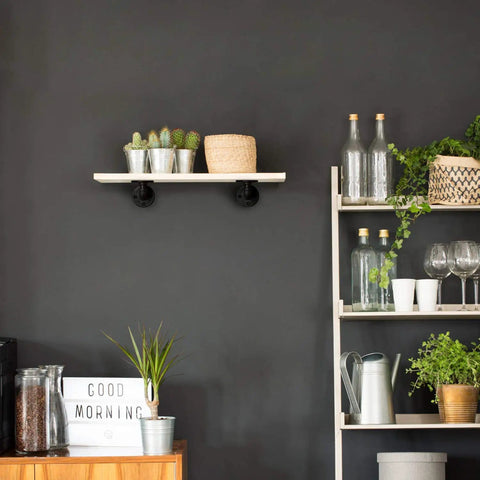 Half Inch Pipe Shelf Bracket Set Of 4 For Wall Mounted Floating Shelves Industrial Rustic Decor Heavy Duty Metal Brackets installed in living room