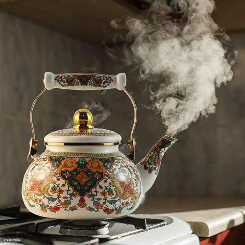 Floral Enamel Tea Kettle With Ceramic Handle Two And A Half Liter Capacity Vintage Gold Beige Boho Porcelain Teapot on stovetop